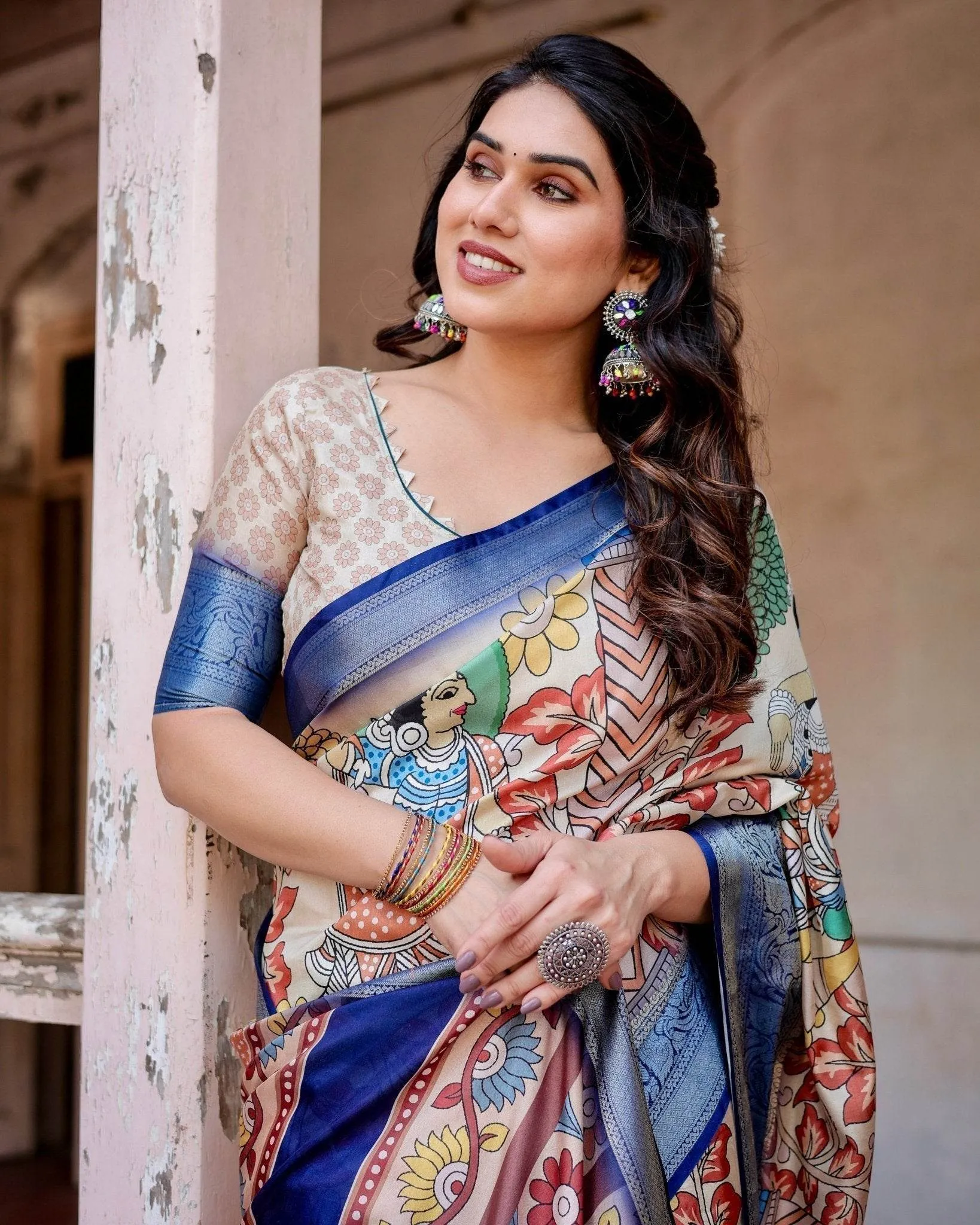 Multicolor Tussar Silk Saree with Artistic Floral Motifs and Traditional Blue Zari Border